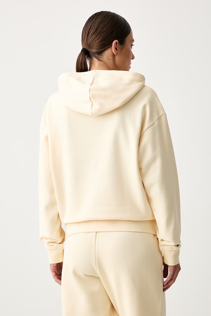 Odzież Puma bluza z kapturem damska z bawełną Essentials 682397 żółty