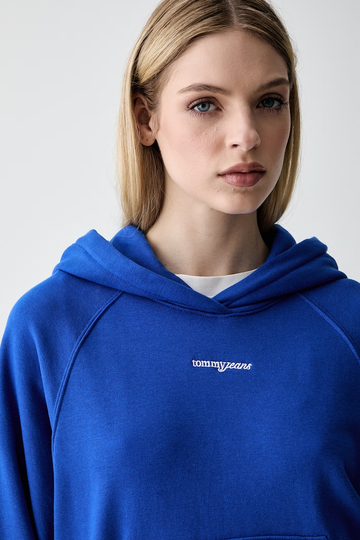 Tommy Jeans pulover s kapuco ženski bombažen modra DW0DW22825