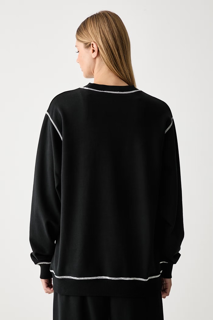 Odjeća Marimekko Oversize dukserica za žene od pamuka 096221 crna