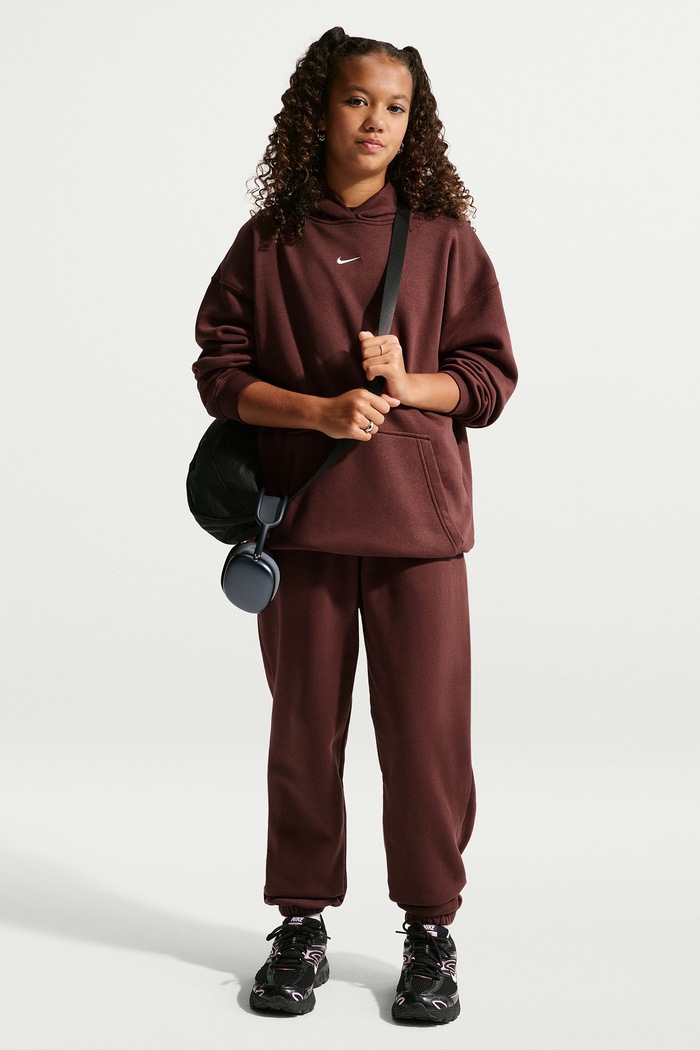 Nike Bluza oversize dziecięca z bawełną Studio Nike Sportswear bordowy IM4964