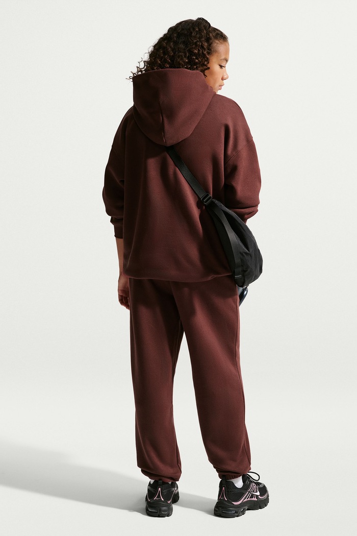 Nike Bluza oversize dziecięca z bawełną Studio Nike Sportswear IM4964 bordowy AW26