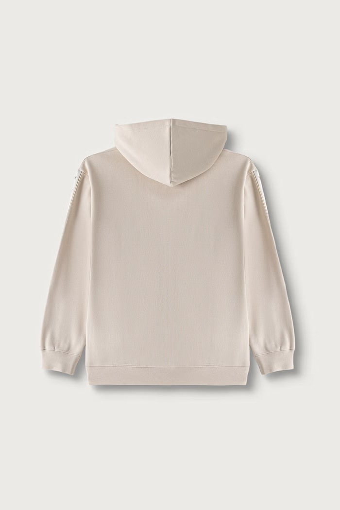 Puma bluza z kapturem dziecięca z bawełną ESS TAPE Relaxed Hoodie 694958.9BY2 beżowy AW26