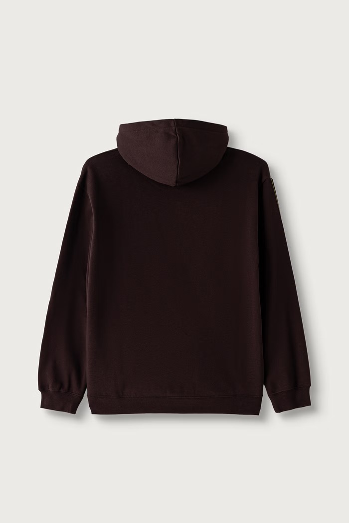 Puma bluza z kapturem dziecięca z bawełną ESS TAPE Relaxed Hoodie 694958 brązowy AW26