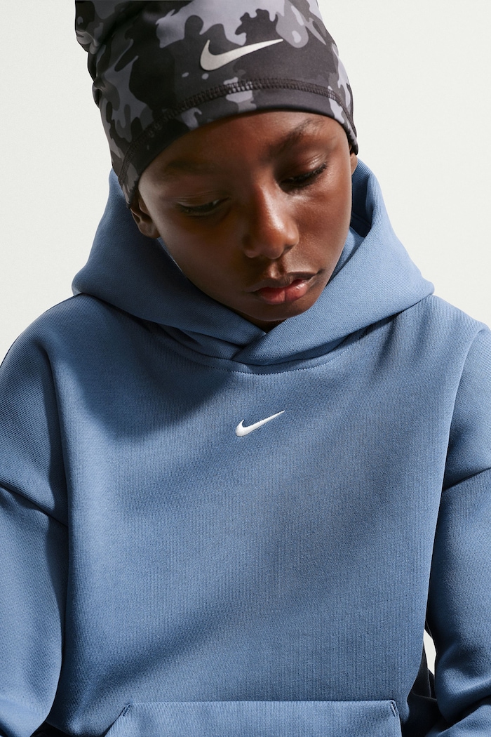 Bluza z kapturem dziecięca z bawełną Nike Sportswear Solo Swoosh Nike niebieski IZ5352
