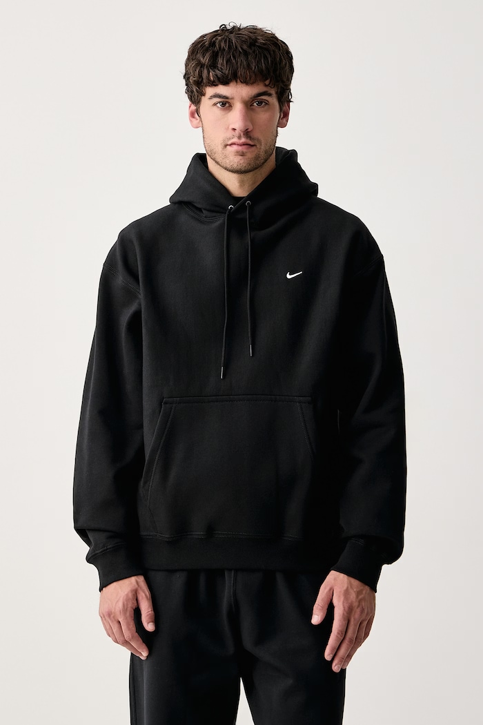 Nike Sportswear Bluza z kapturem męska z bawełną Solo Swoosh czarny HV1082.010