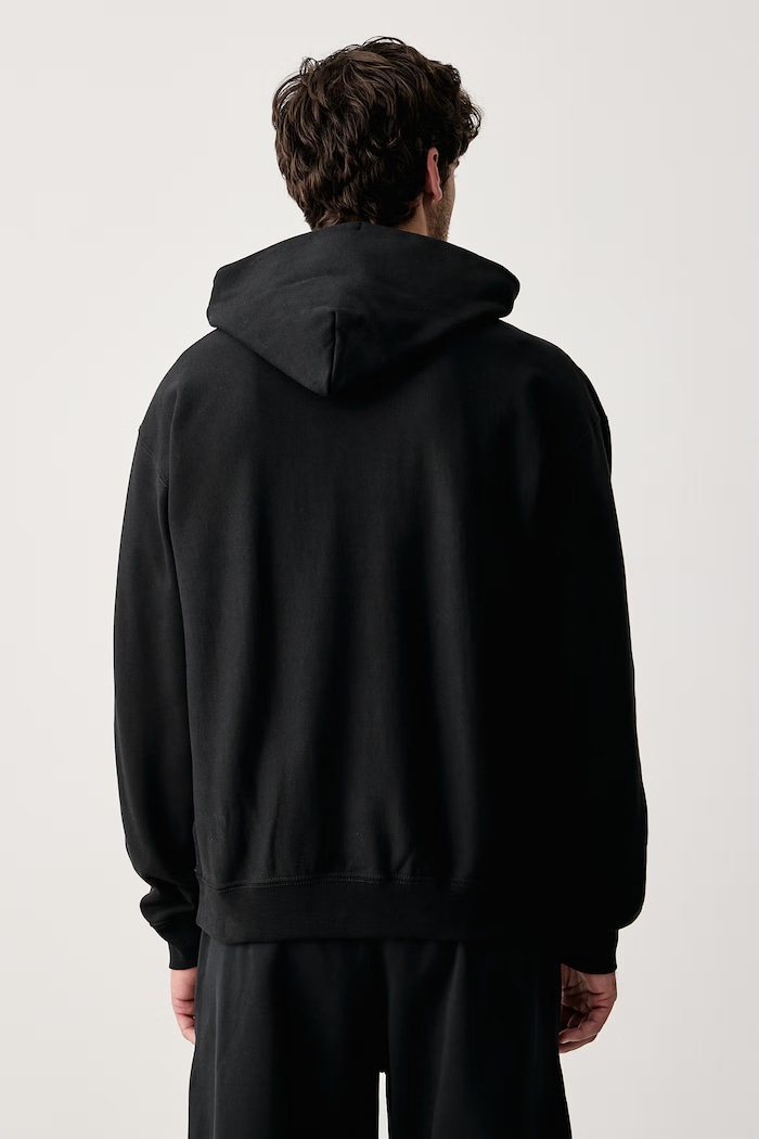 Odzież Nike Sportswear Bluza z kapturem męska z bawełną Solo Swoosh HV1082.010 czarny