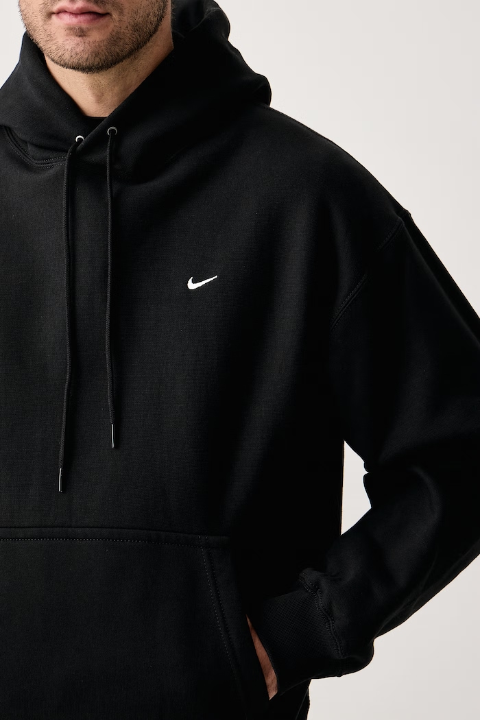 Bluza z kapturem męska z bawełną Solo Swoosh Nike Sportswear HV1082.010 czarny