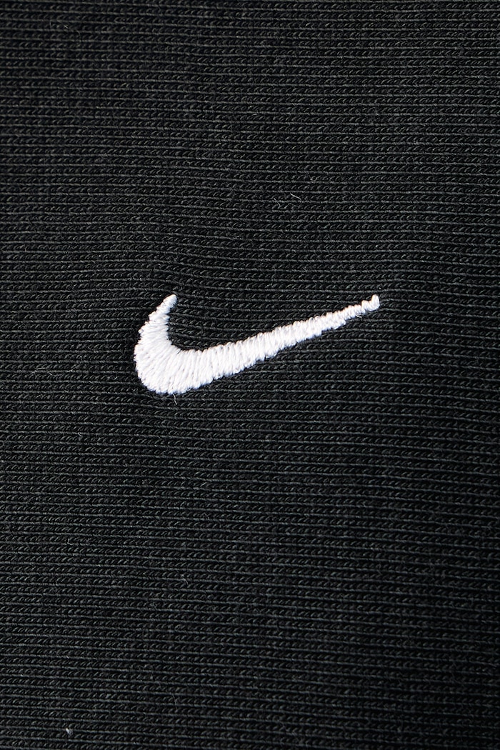 Bluza z kapturem męska z bawełną Solo Swoosh Nike Sportswear czarny HV1082.010