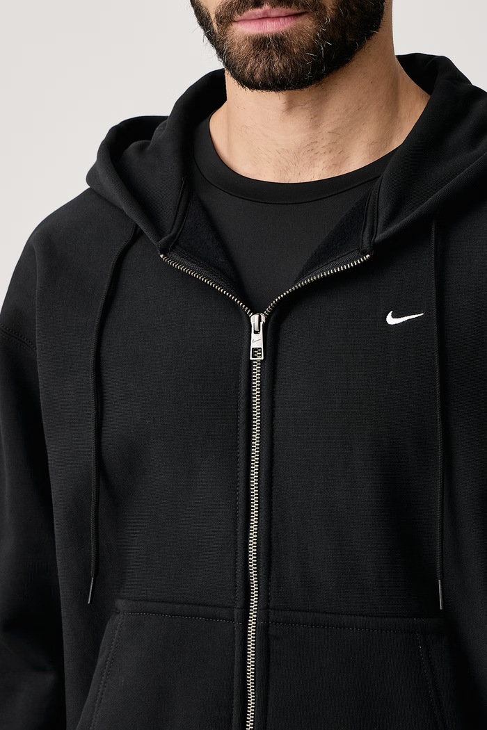 Mikina na zips s kapucňou pánska s bavlnou Solo Swoosh Nike Sportswear HV1084.010 čierna