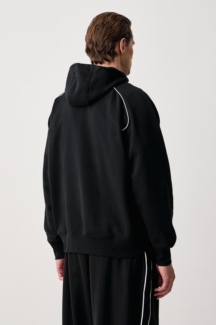 Odzież Nike Sportswear Bluza z kapturem męska z bawełną Air IF1266.010 czarny