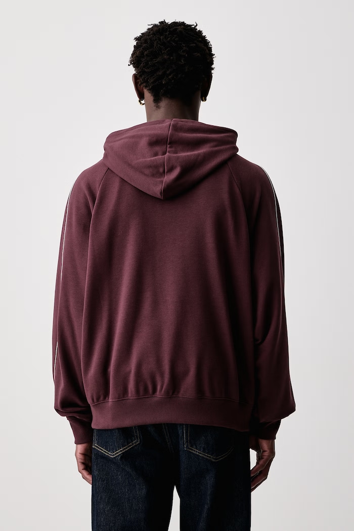 Odzież New Balance Bluza z kapturem męska z bawełną MT62W318YLR czerwony