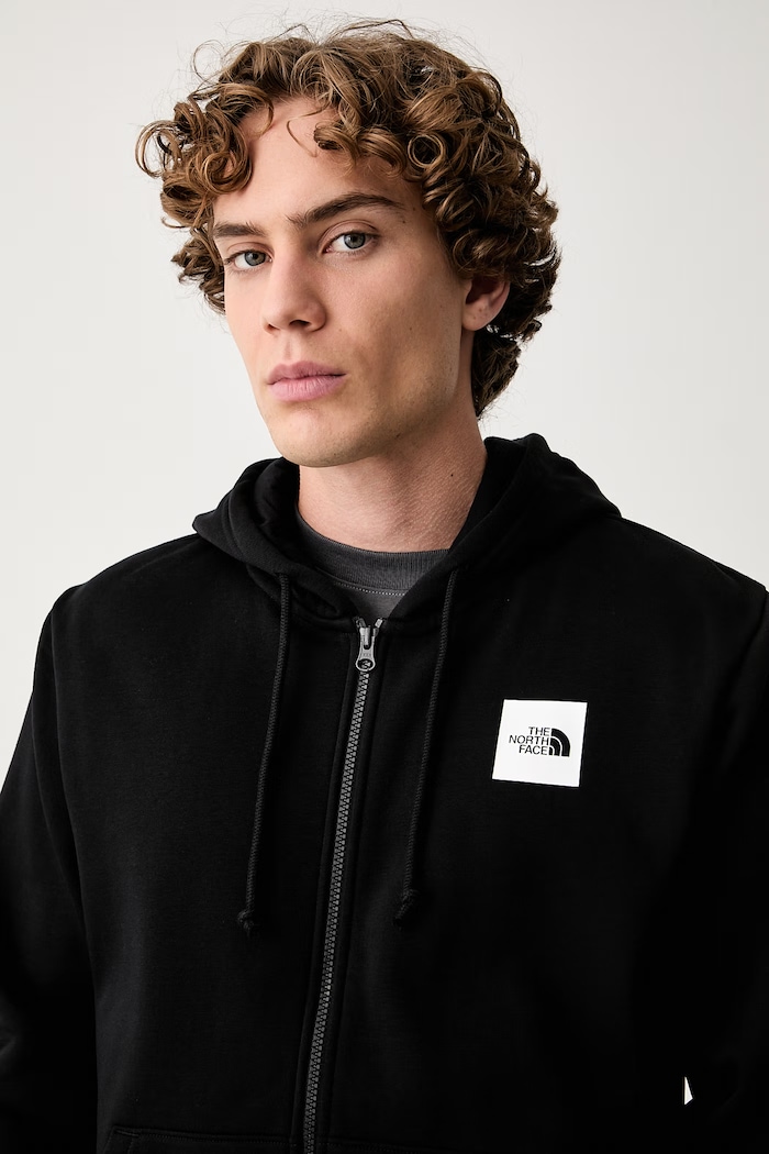 The North Face jopica s kapuco moška z bombažem Box Regular črna NF0A8JAZJK31