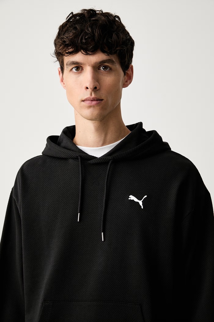 Puma bluza z kapturem męska z bawełną Essentials Elevated czarny 694309