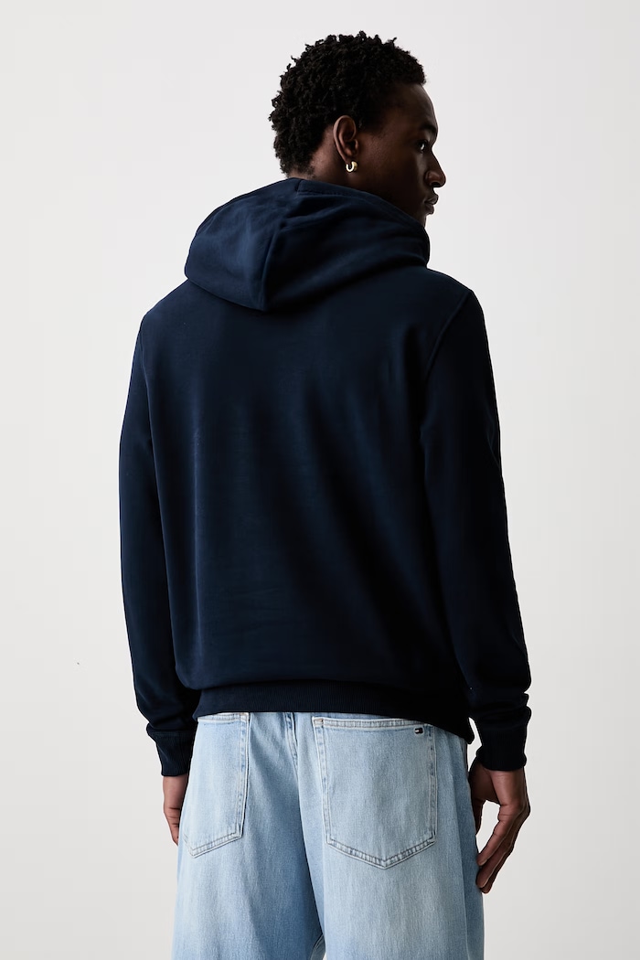 Odjeća Tommy Jeans dukserica sa kapuljačom za muškarce od pamuka DM0DM23153 mornarsko plava