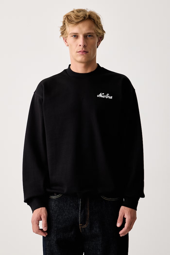 New Era Pulover bombažen 60897433 črna AW26