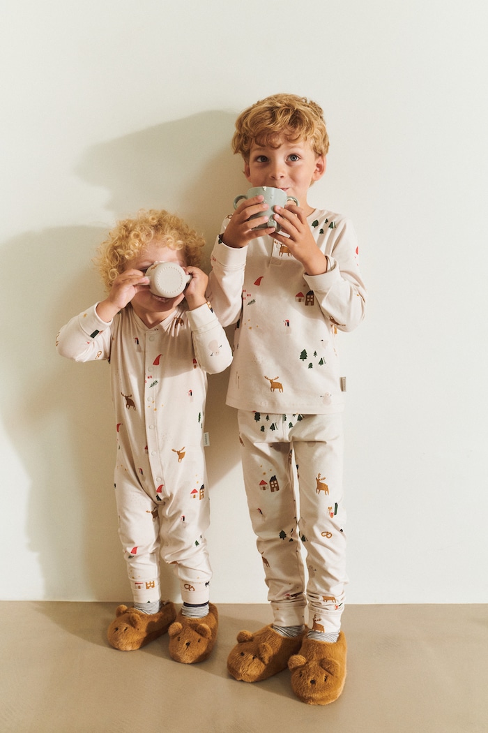 Pajacyk dziecięcy bawełniany z elastanem Birk Grow Printed Pyjamas Jumpsuit Liewood beżowy LW20983.9BY2