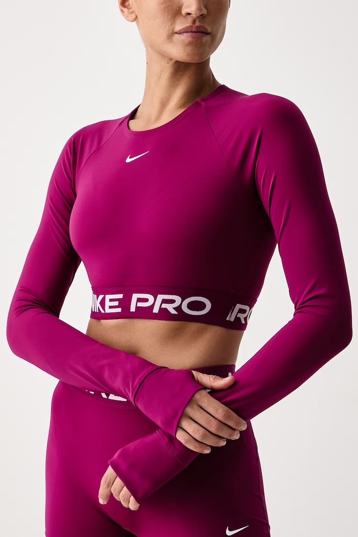 Longsleeve treningowy damski Nike Pro Dri-FIT Nike FV5484.630 różowy