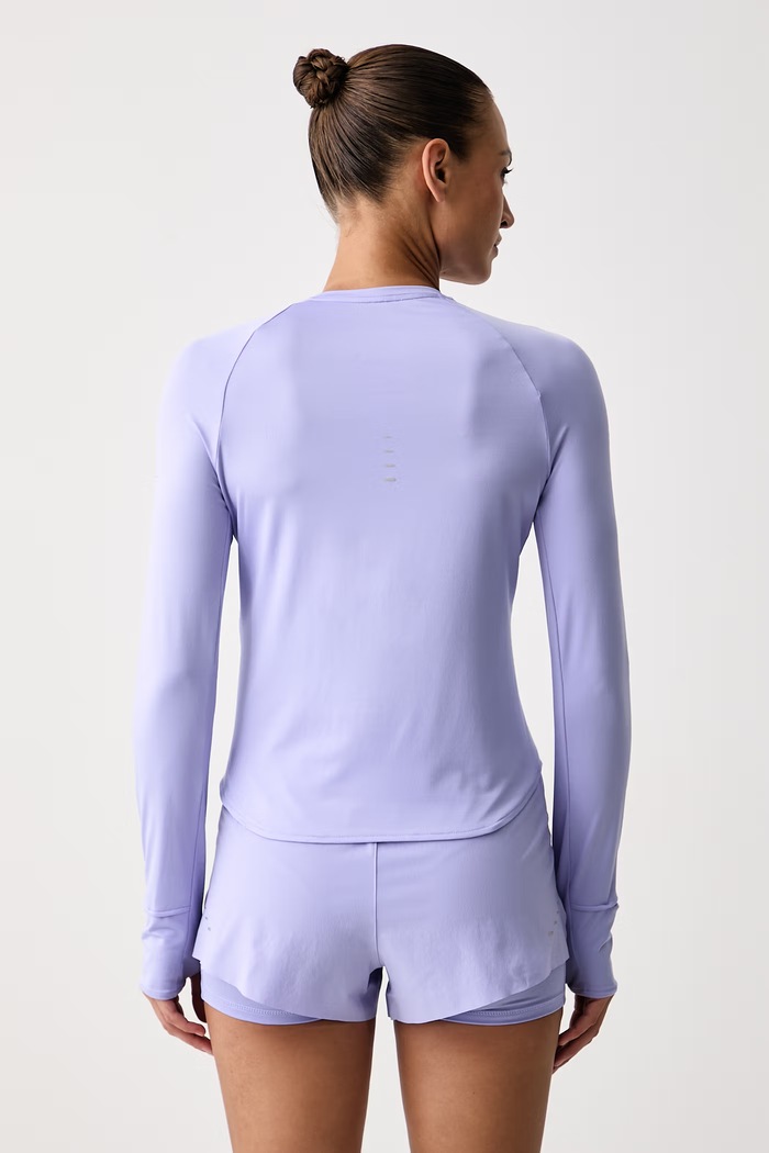 Odzież Nike Longsleeve sportowy damski Swift Dri-FIT UV HQ0503.580 fioletowy