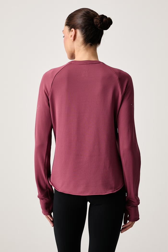 Odzież Nike Longsleeve do biegania damski Swift Therma-FIT IM8050.654 różowy