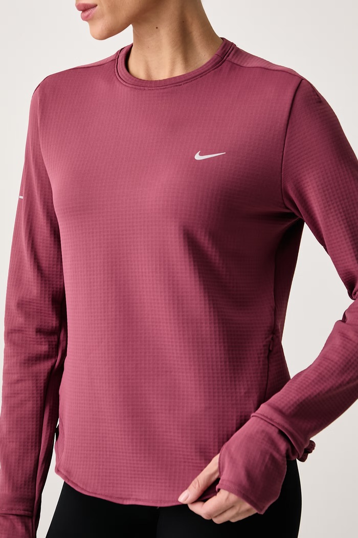 Longsleeve do biegania damski Swift Therma-FIT Nike IM8050.654 różowy