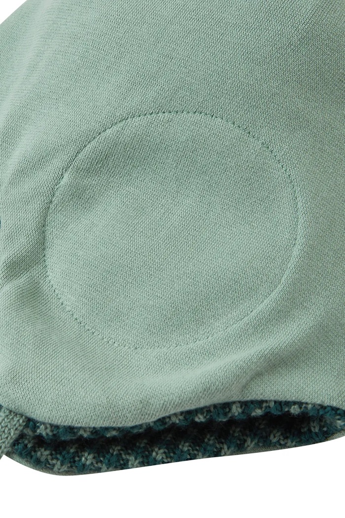 Czapka z pomponem dziecięca z wełny merino Kuuru Reima turkusowy 5300215B.9BY2