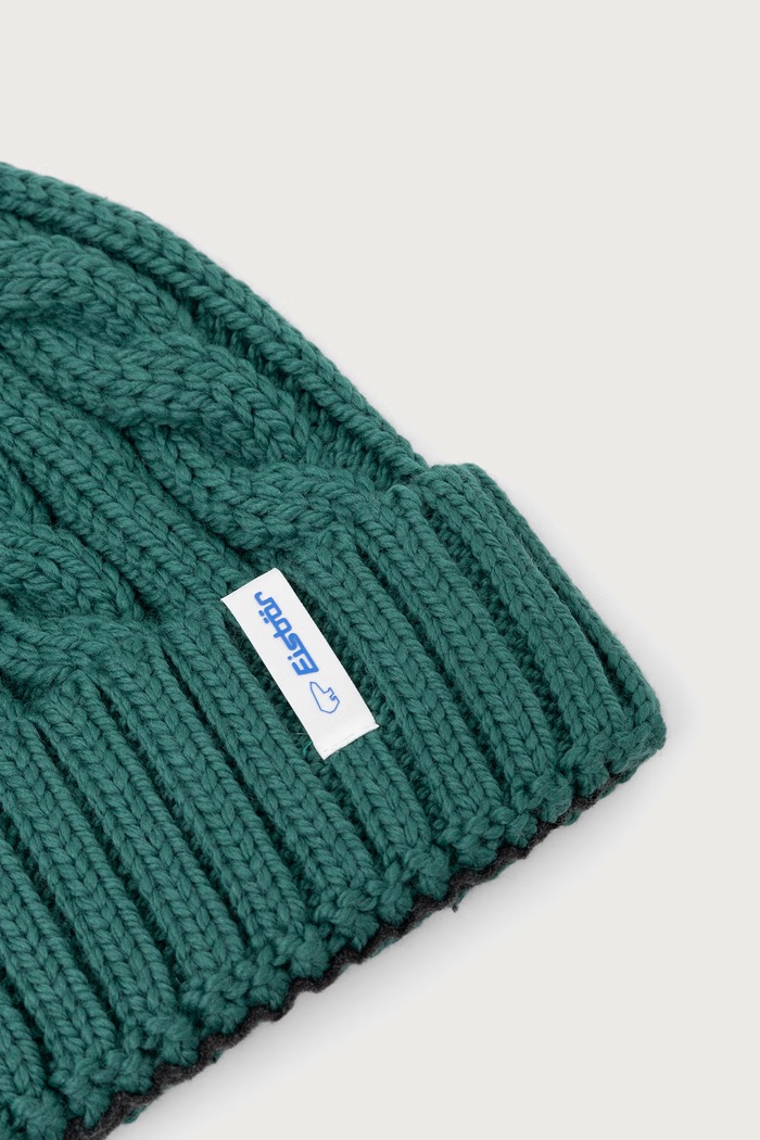 Akcesoria Eisbar Czapka z pomponem z wełną merino Alba Pompon MÜ E31063 turkusowy