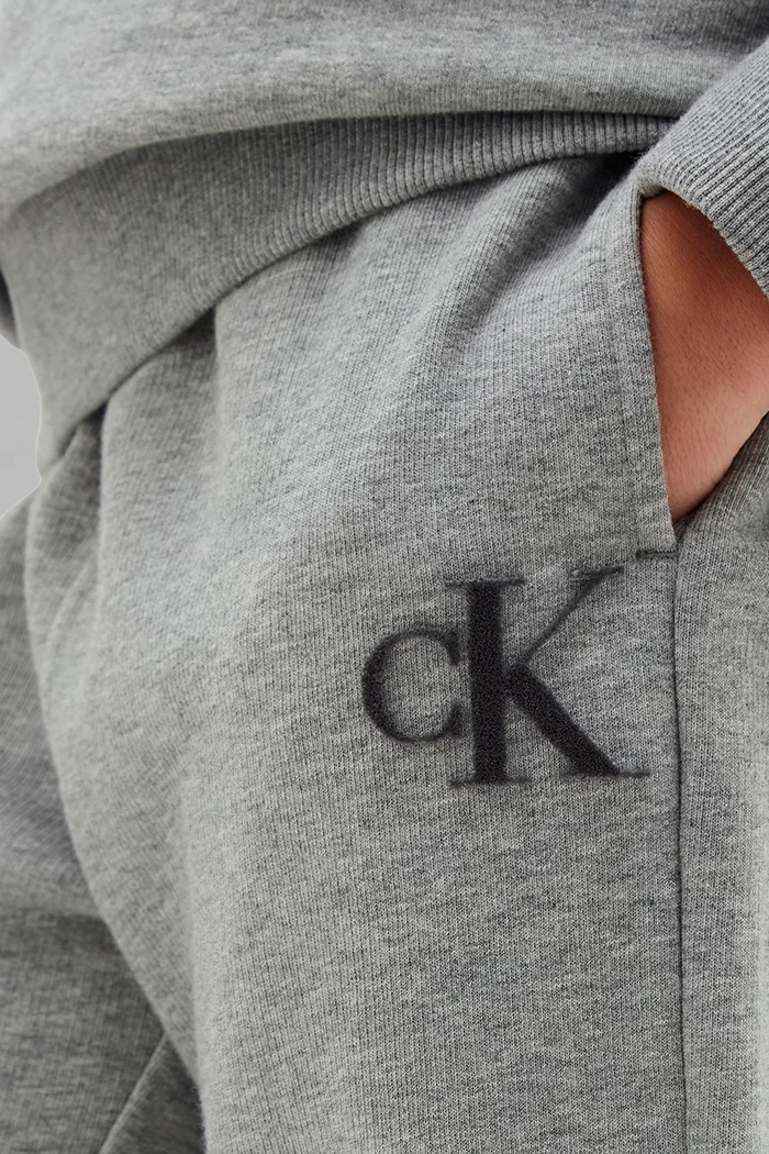 Calvin Klein Jeans spodnie dresowe dziecięce z bawełną LVCKTJC43B.128.176.9BY2 szary