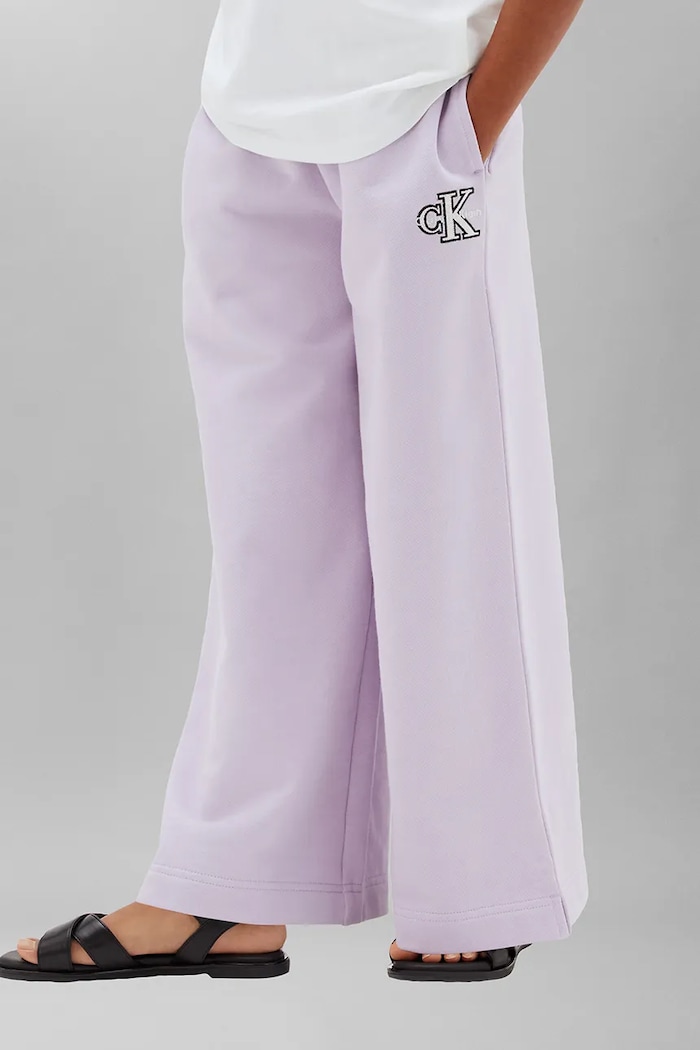 Calvin Klein Jeans teplákové nohavice detské bavlnené fialová LVCKTJC36G.128.170.9BY2