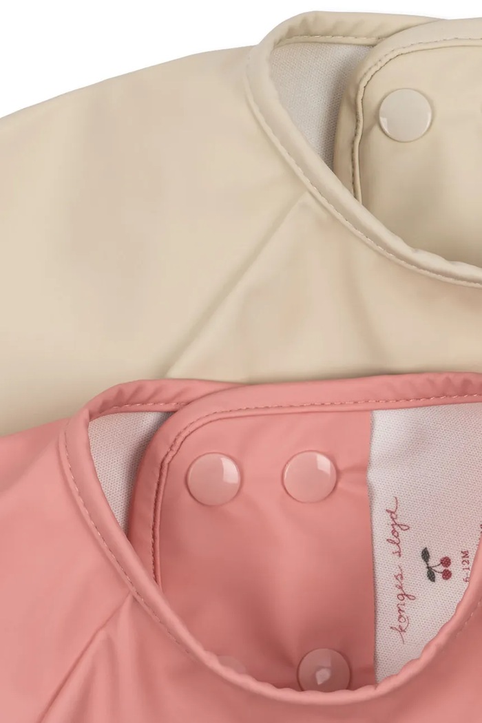 Konges Sløjd Podbradník detský 2 PACK DINNER BIB WITH SLEEVES 2-pak KS105834.9BY2 ružová AW26