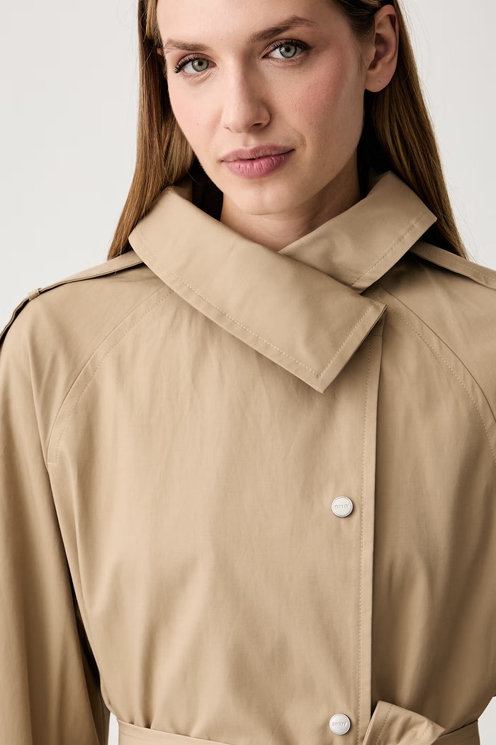 DKNY płaszcz damski z bawełną beżowy DLEMPY55