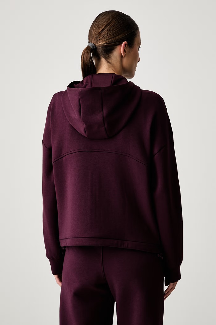 Ρούχα Under Armour μπλούζα με κουκούλα γυναικεία Unstoppable 6013520 μπορντό