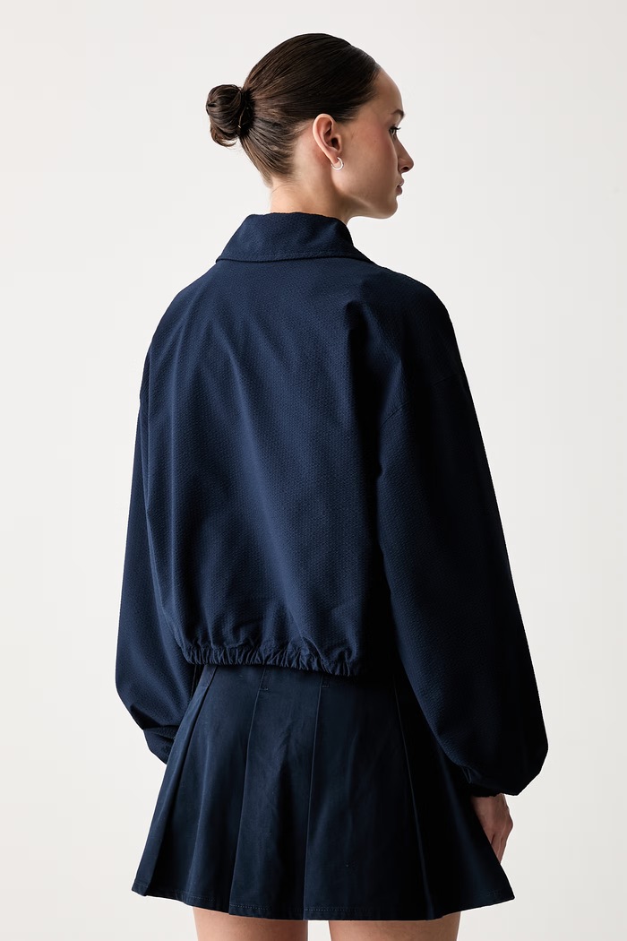 Odjeća Tommy Jeans prijelazna jakna za žene DW0DW22912 mornarsko plava