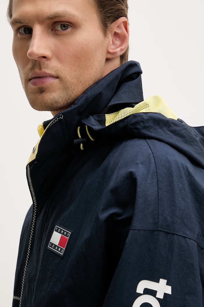 Tommy Jeans geacă de tranziție pentru bărbați bleumarin DM0DM23225