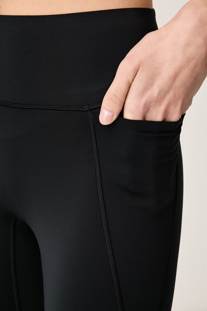 Legginsy sportowe damskie Nike Universa Nike HQ6813.010 czarny