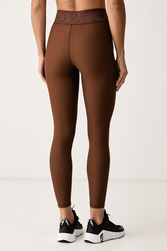 Odzież Nike Legginsy sportowe damskie Nike Pro Sculpt Therma-FIT IM9749.259 brązowy