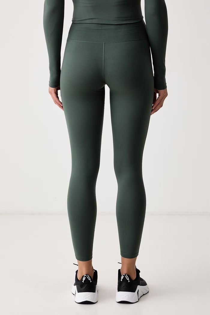 Odzież Nike Legginsy sportowe damskie Nike One IO0579.303 zielony
