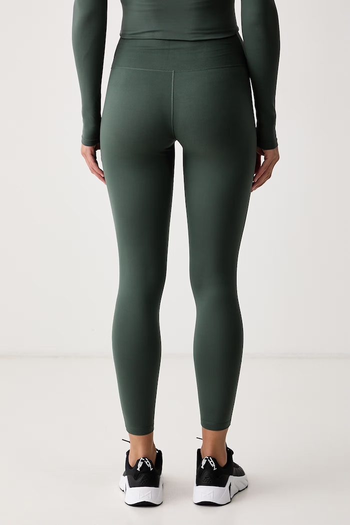 Odzież Nike Legginsy sportowe damskie Nike One IO0579.303 zielony