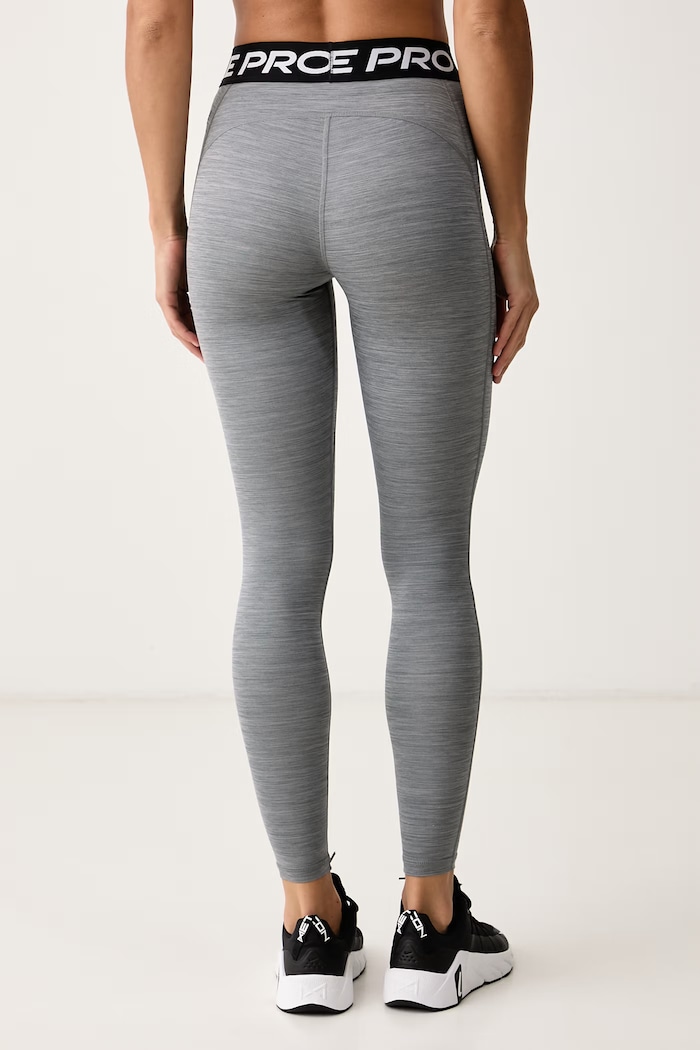 Odzież Nike Legginsy sportowe damskie Nike Pro IQ0886.084 szary