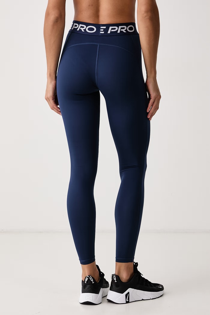 Odzież Nike Legginsy sportowe damskie Nike Pro IQ0886.410 granatowy