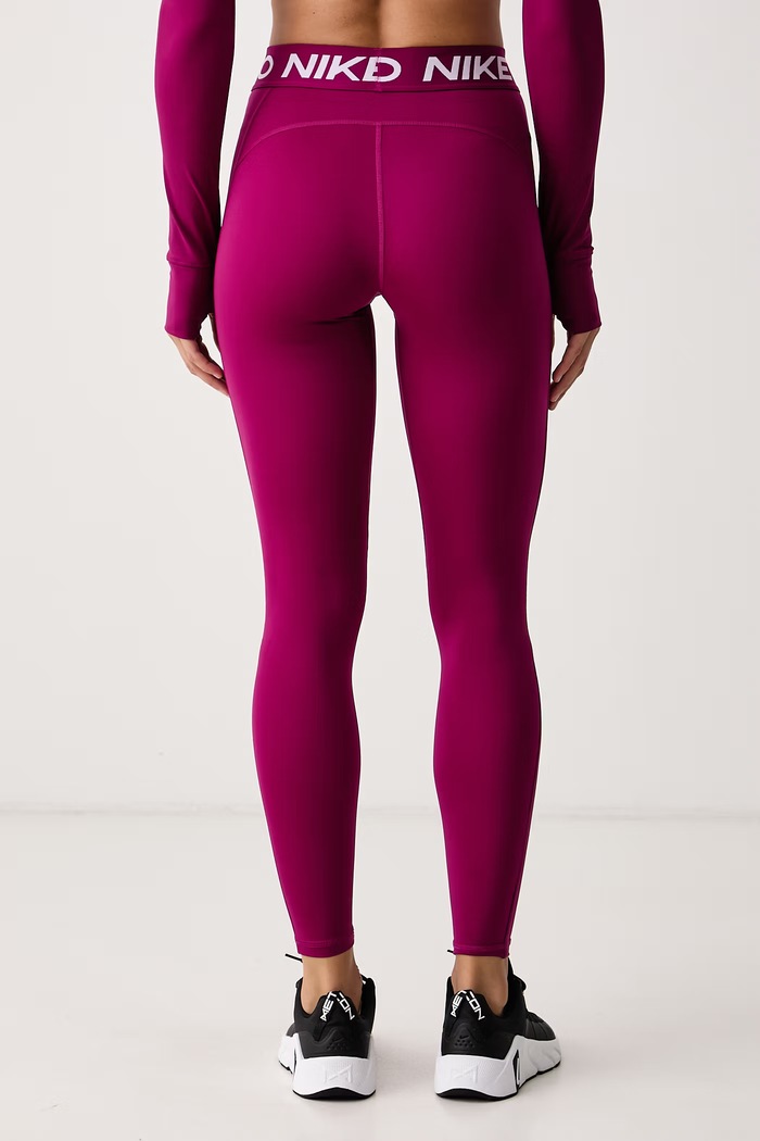 Odzież Nike Legginsy sportowe damskie Nike Pro IQ0886.630 różowy
