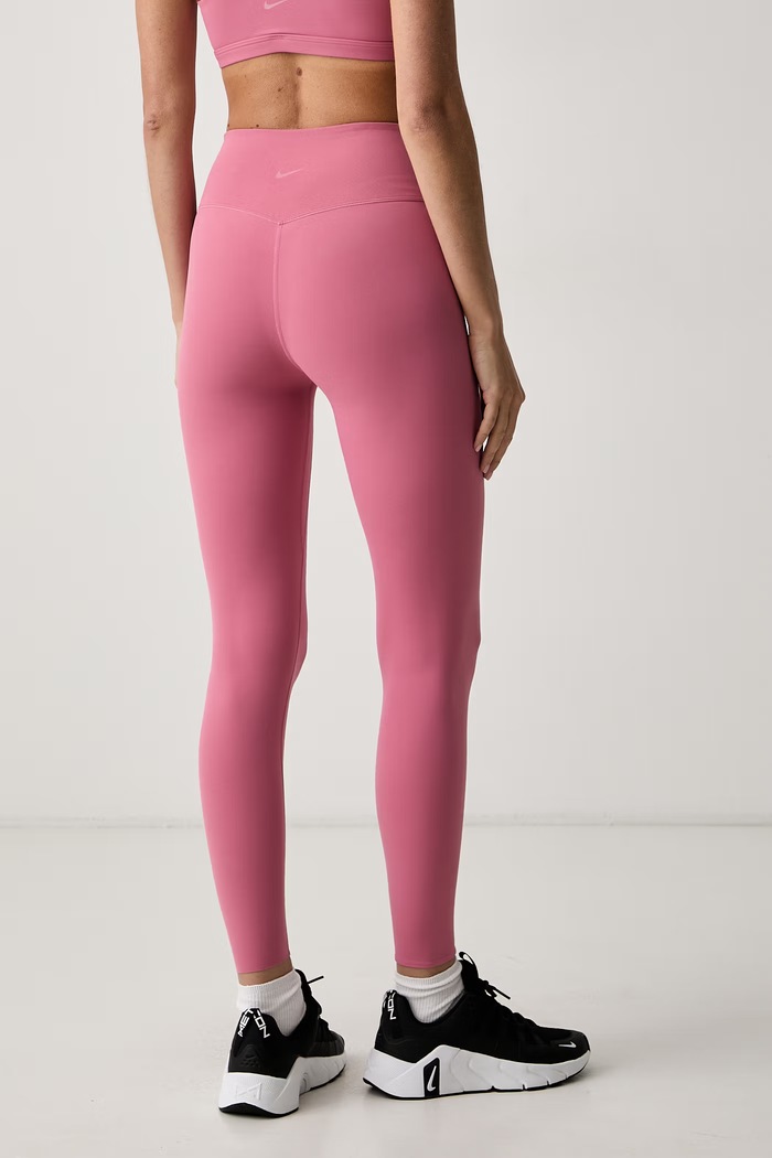 Odzież Nike legginsy sportowe damskie Zenvy II5233.641 różowy