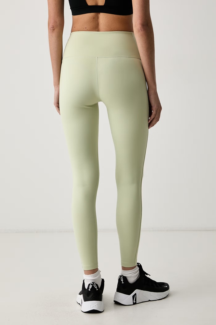 Odzież Nike legginsy sportowe damskie One IO1293.371 zielony