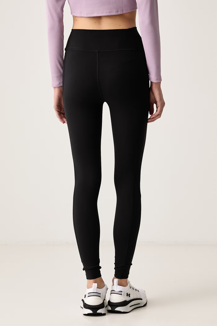 Odzież Under Armour Legginsy sportowe damskie Motion 6013784 czarny
