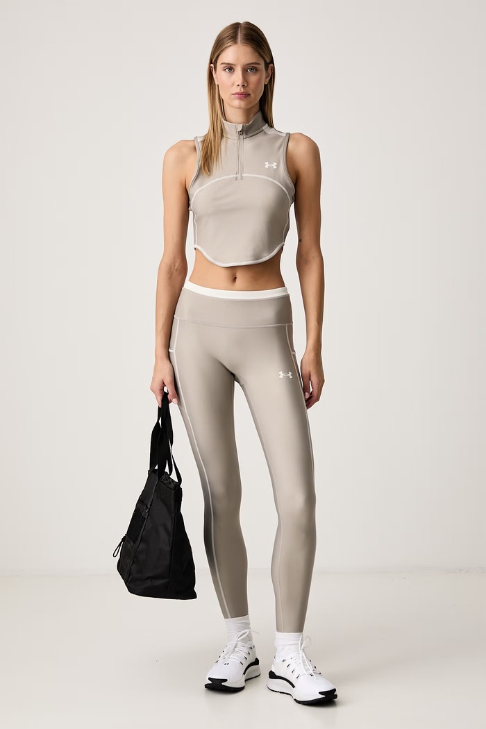 Under Armour Legginsy sportowe damskie HeatGear 6013661 beżowy AW26