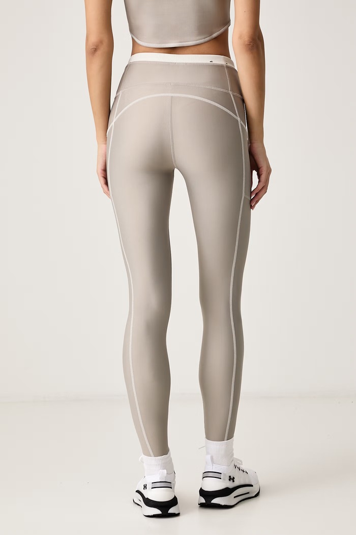 Odzież Under Armour Legginsy sportowe damskie HeatGear 6013661 beżowy