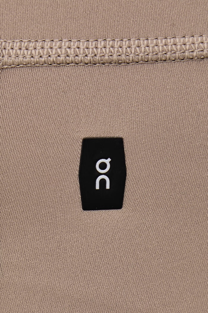 Legginsy sportowe damskie On 1WG30255013 brązowy