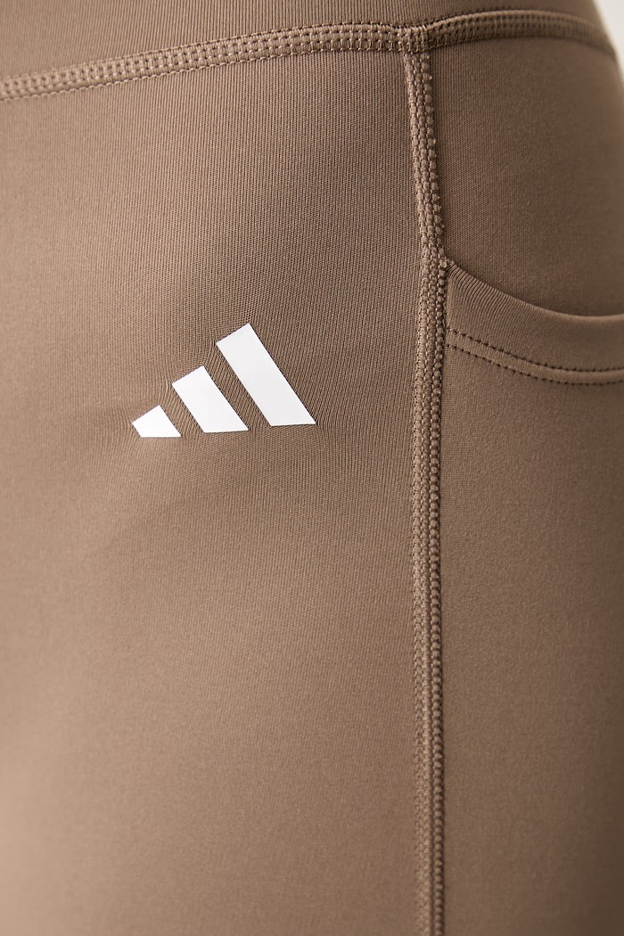 Športové legíny dámske Optime Essentials adidas Performance KT3832 zelená