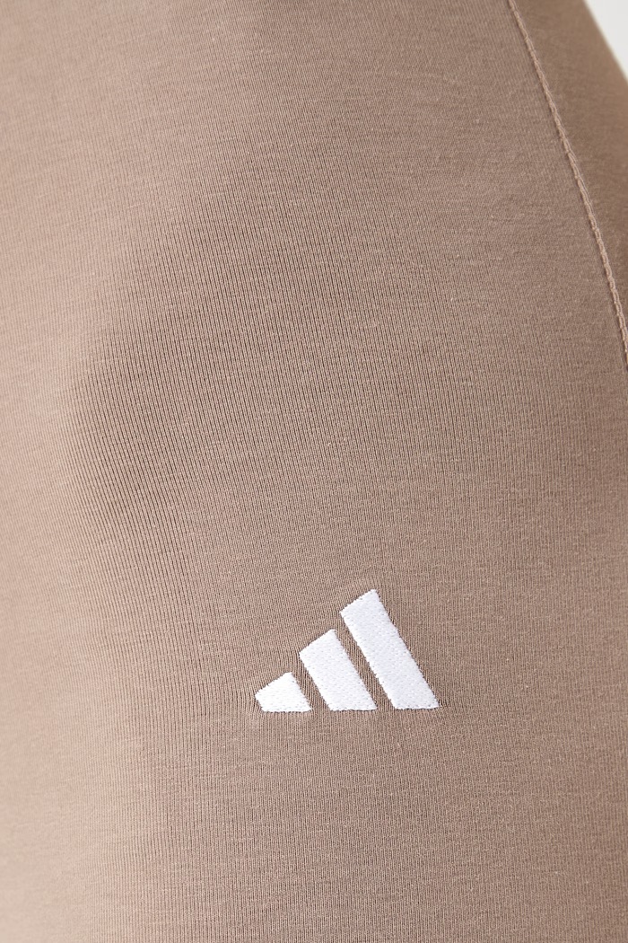 adidas legginsy damskie bawełniane z elastanem Soft Lux beżowy KF8410