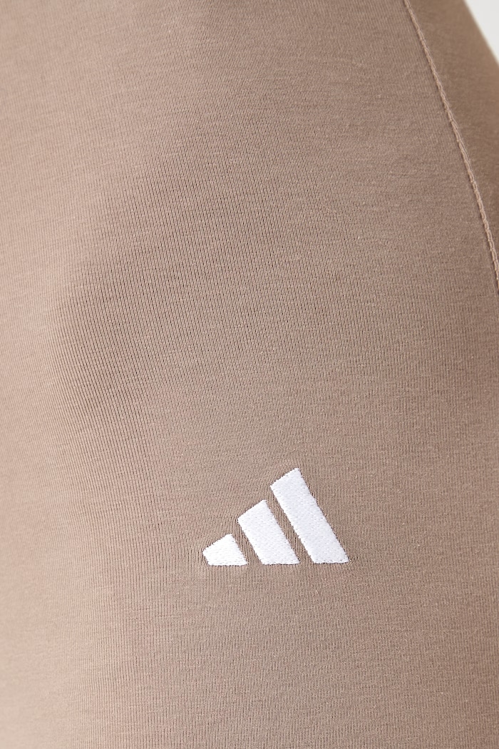 adidas legginsy damskie bawełniane z elastanem Soft Lux beżowy KF8410