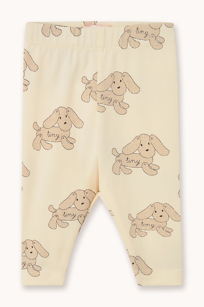 Tinycottons Legginsy dziecięce bawełniane z elastanem DOGS BABY LEGGINGS beżowy AW26.299